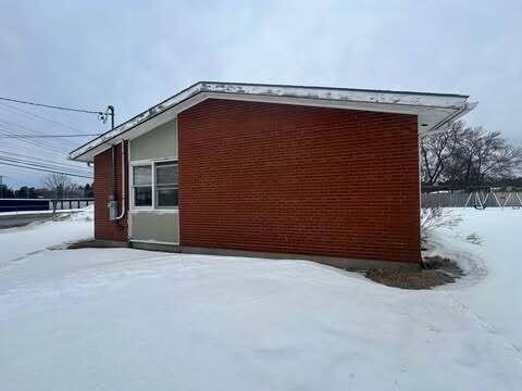 view of snow covered property