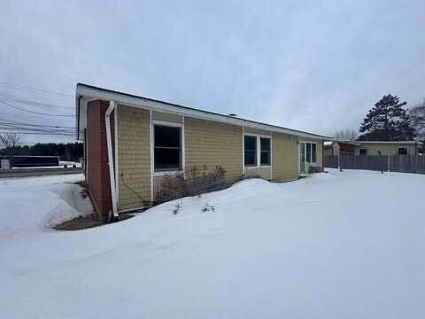 view of snow covered property