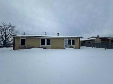 view of snow covered property