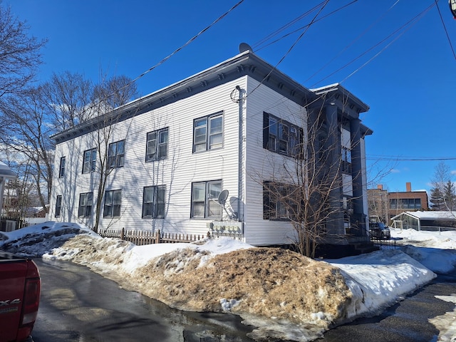 view of snow covered property