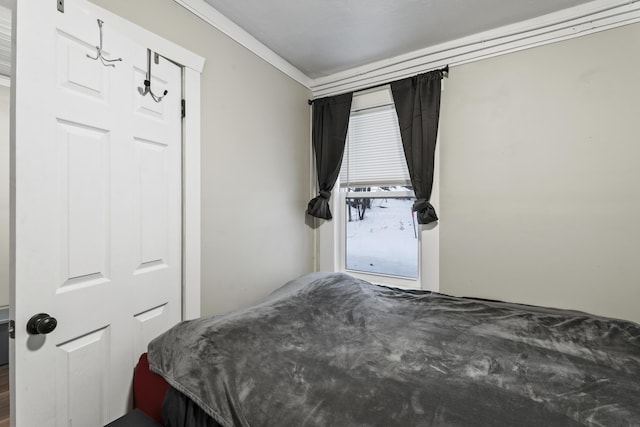 bedroom with crown molding