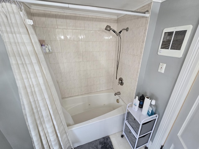 bathroom with visible vents and shower / bathtub combination with curtain