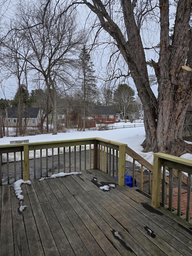 view of snow covered deck