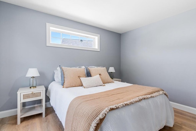 7 Parsonage Rd Unit 5, North Yarmouth, ME 04097 - bedroom featuring baseboards and wood finished floors
