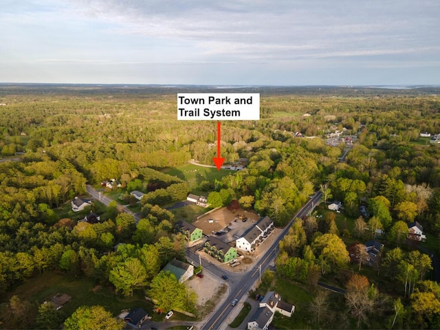 7 Parsonage Rd Unit 5, North Yarmouth, ME 04097 - birds eye view of property featuring a wooded view