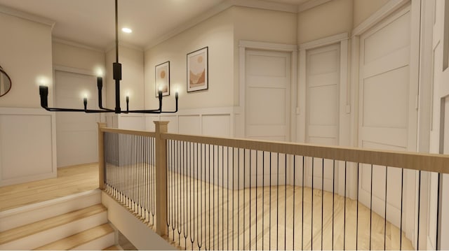 300 N Rd, Yarmouth, ME 04096 - hallway with a decorative wall, ornamental molding, wood finished floors, recessed lighting, and a chandelier