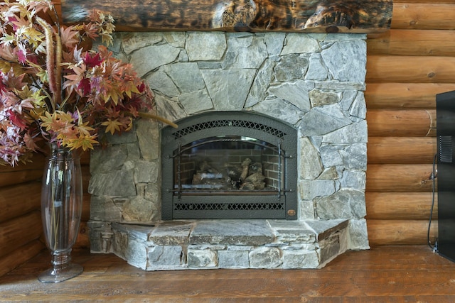 room details with log walls and wood finished floors