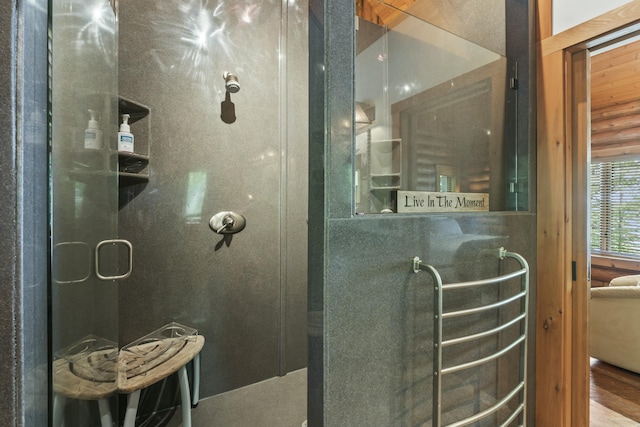 bathroom with a tile shower