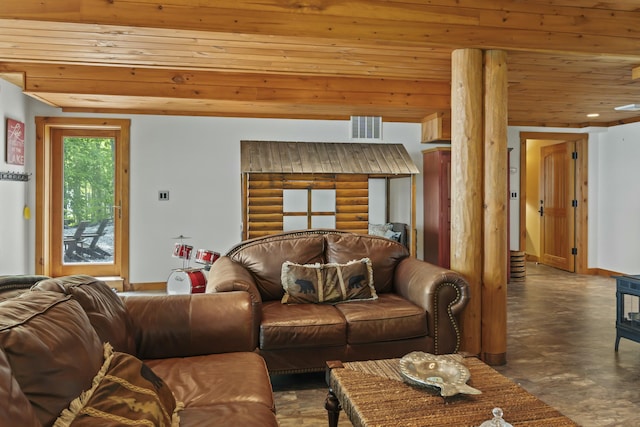 living room with wood ceiling, concrete floors, visible vents, and baseboards