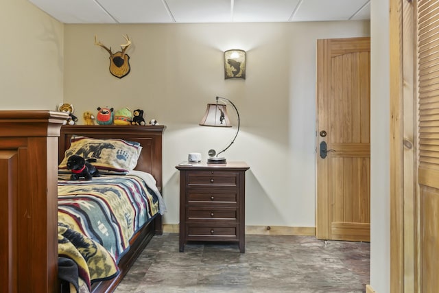 bedroom with a drop ceiling