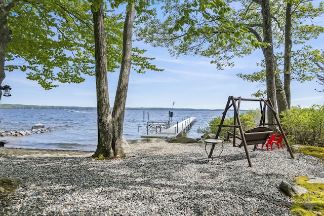 exterior space with a water view