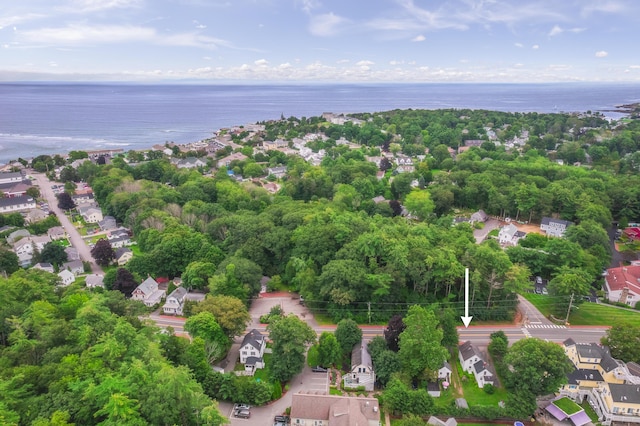 drone / aerial view featuring a water view and a residential view