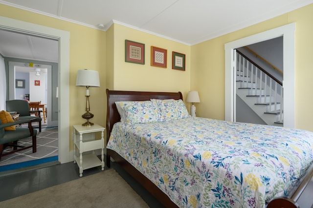 bedroom with ornamental molding