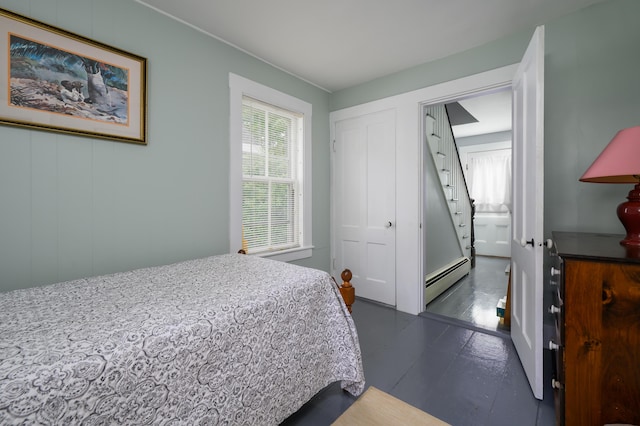 bedroom featuring baseboard heating