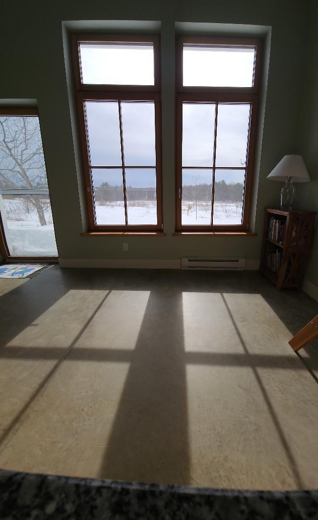 interior space featuring baseboard heating