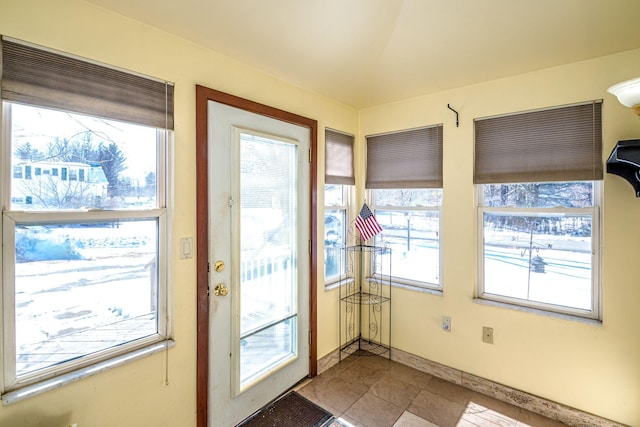 doorway with baseboards