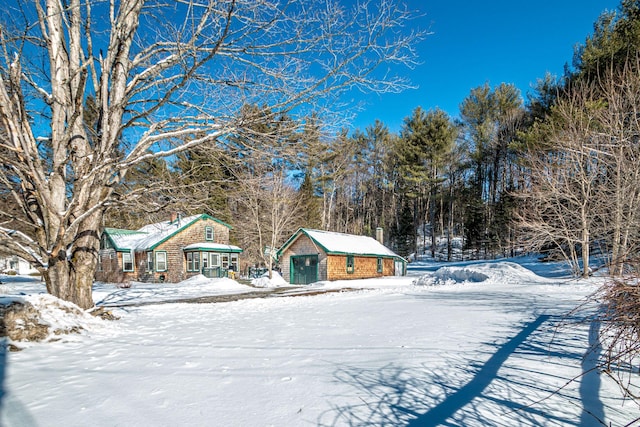 view of front of property with an outbuilding and a chimney