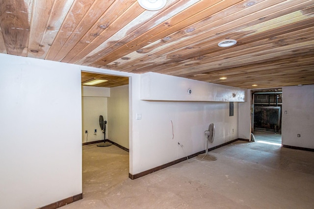 finished below grade area with wooden ceiling and baseboards