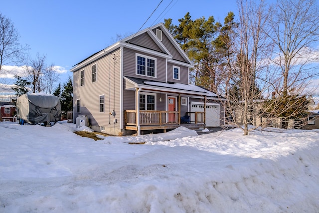 view of front of home featuring a garage and a porch