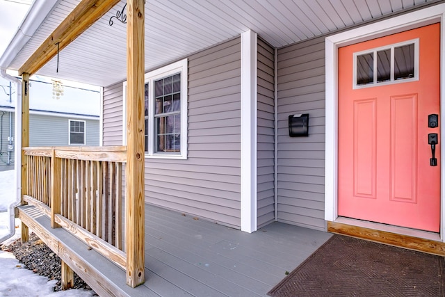 doorway to property with a porch