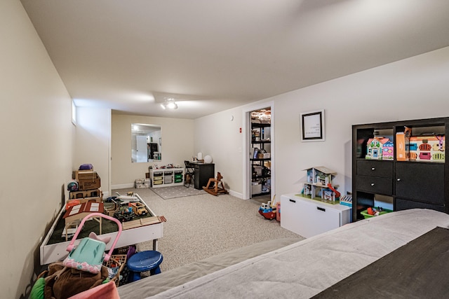 game room with carpet and baseboards