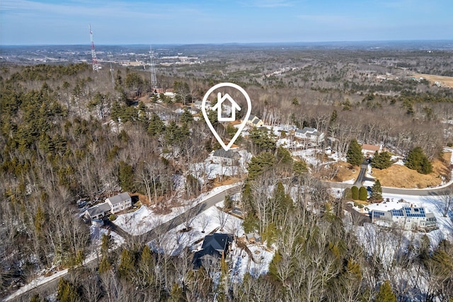 aerial view with a wooded view