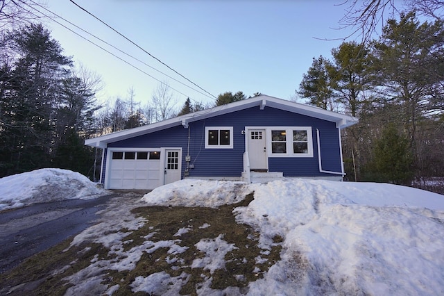 view of front of property featuring a garage