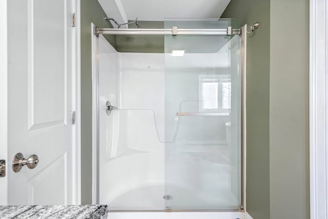 full bath featuring a stall shower