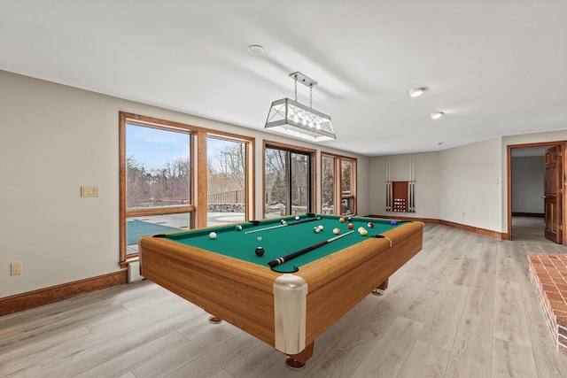 rec room with baseboards, a wealth of natural light, pool table, and light wood-style flooring