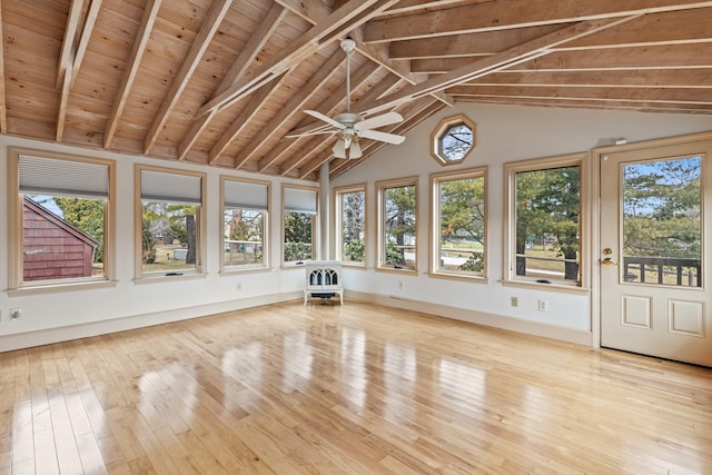 unfurnished sunroom featuring hardwood / wood-style floors, a wealth of natural light, wooden ceiling, and lofted ceiling with beams