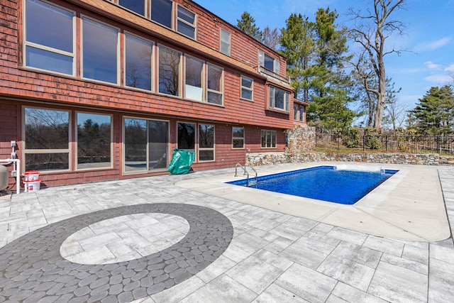 view of pool with fence, a patio, and a fenced in pool