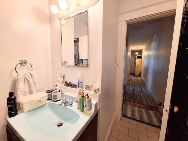 bathroom with vanity and tile patterned floors