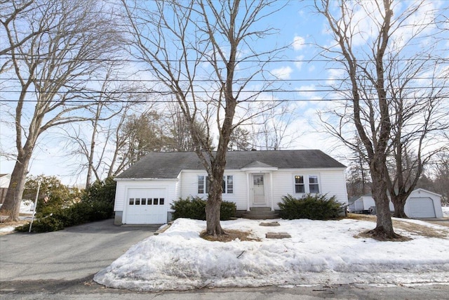 view of front of house with a garage and driveway