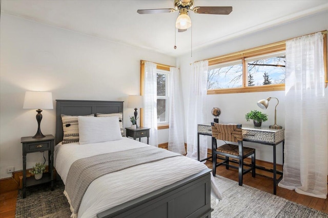 bedroom featuring a ceiling fan and light wood finished floors