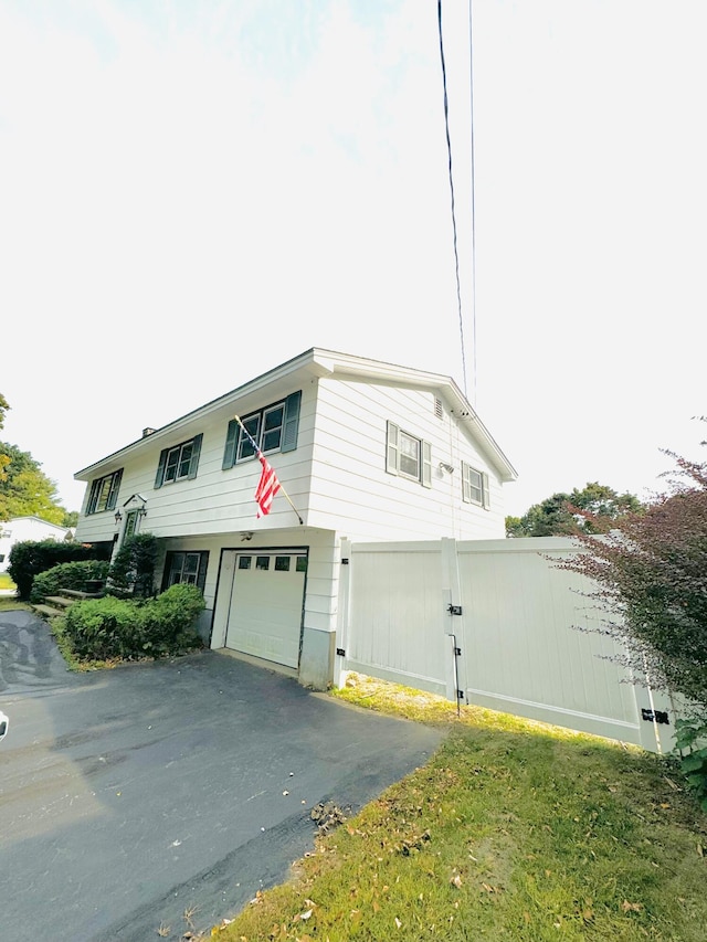 view of front of home featuring driveway and an attached garage