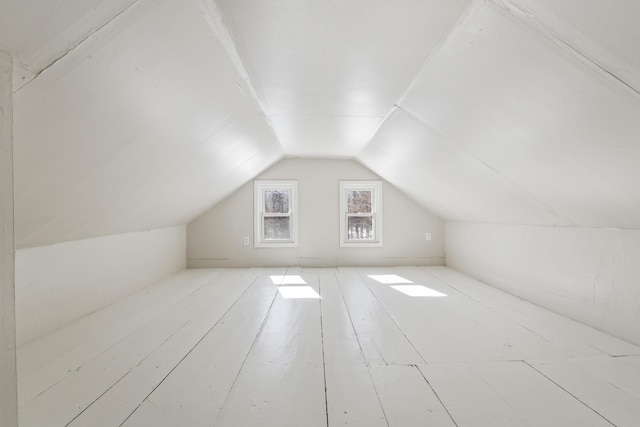 bonus room with vaulted ceiling