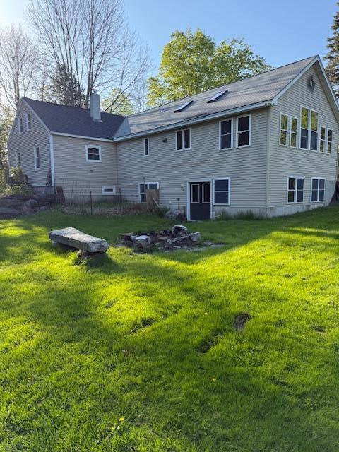 170 Hathaway Rd, Winthrop, ME 04364 - rear view of house featuring a yard and a chimney