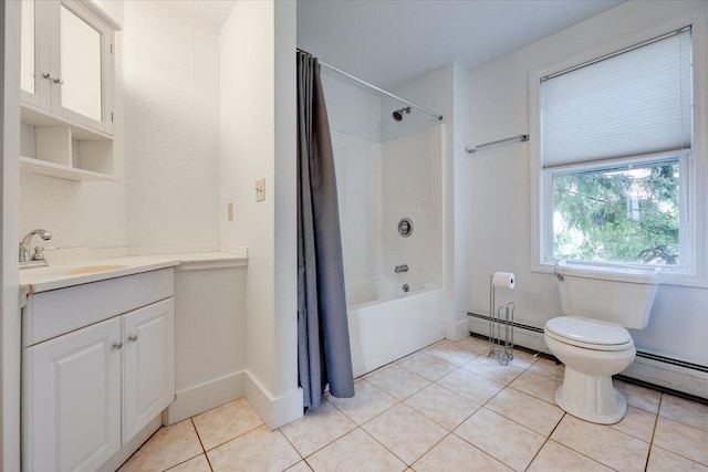 bathroom with toilet, tile patterned flooring, a baseboard heating unit, and vanity