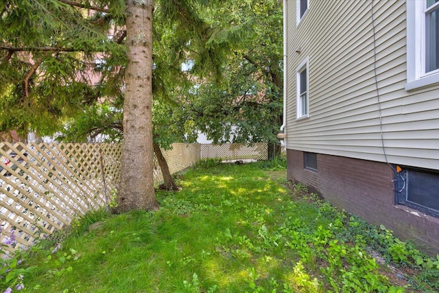 view of yard with fence