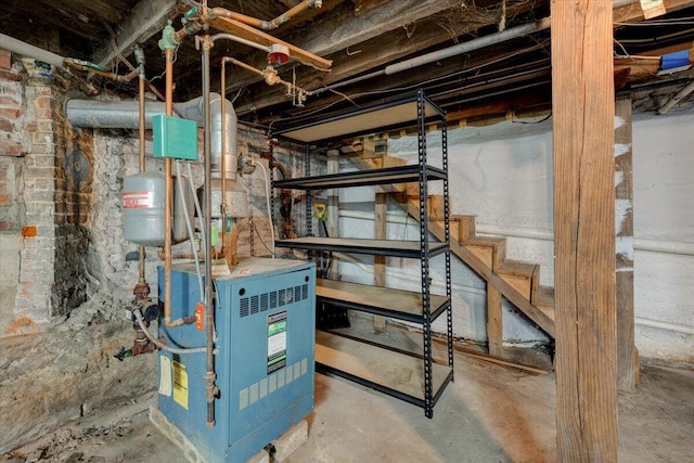 unfinished basement featuring a heating unit