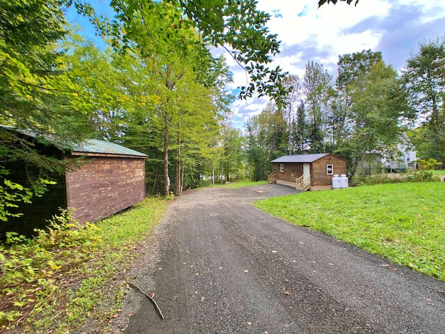 view of road with driveway