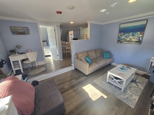 living area featuring ornamental molding, recessed lighting, baseboards, and wood finished floors