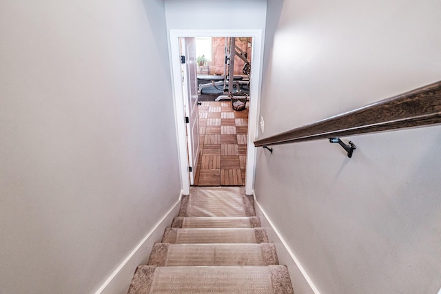 staircase with baseboards