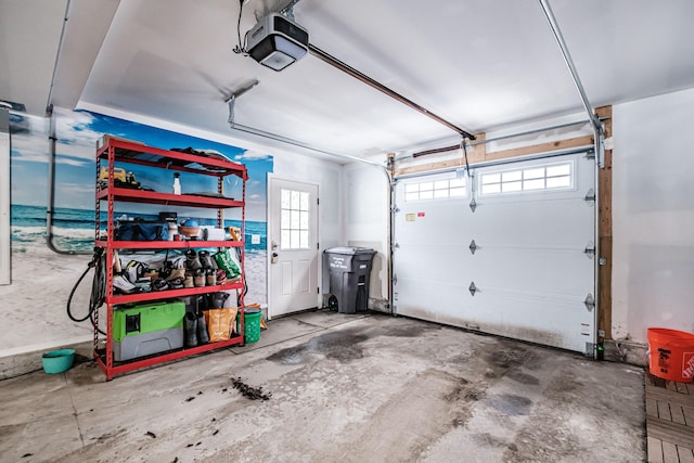 garage featuring a garage door opener