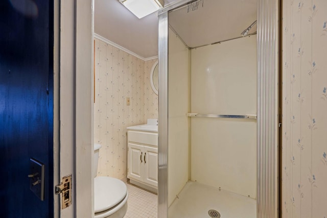 full bathroom featuring a stall shower, crown molding, toilet, vanity, and wallpapered walls