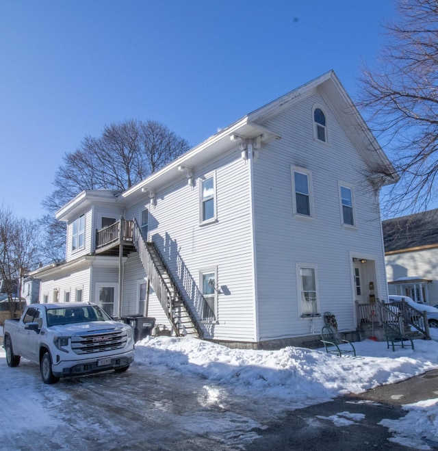 view of snow covered property