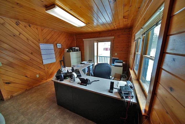 office area featuring wood ceiling, wooden walls, and tile patterned floors