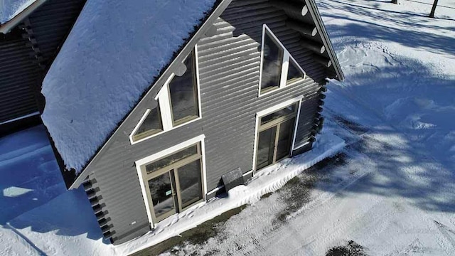 view of snow covered property