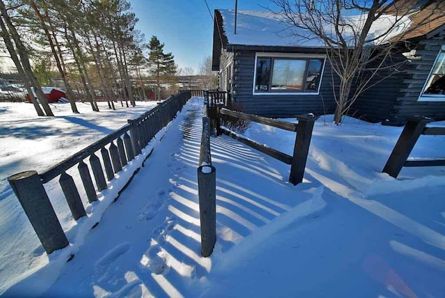 view of snow covered property