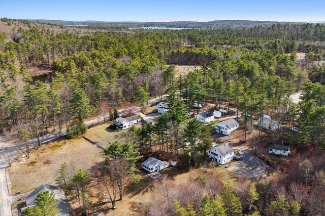 aerial view with a wooded view
